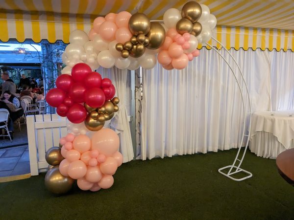 Organic half arch pink white gold on white arch frame Victoria gold park. 21st birthday balloons
