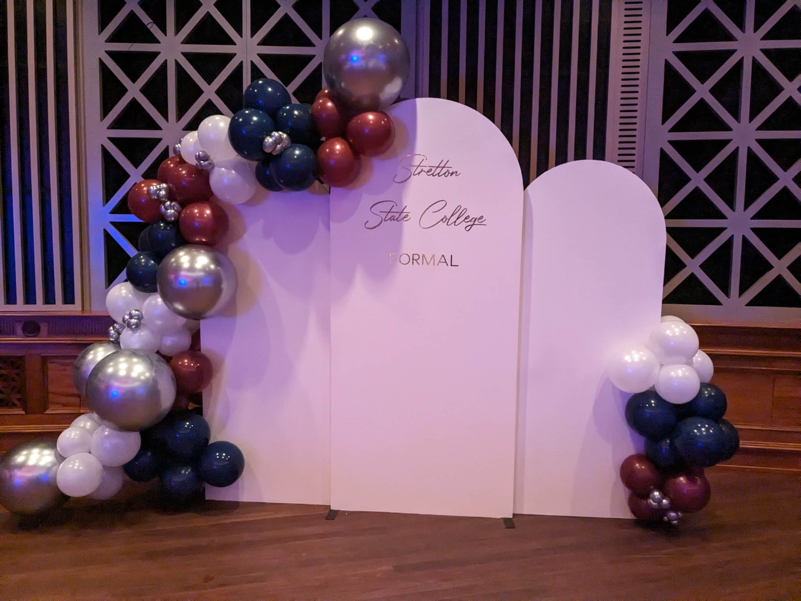 brisbane town hall organic half arch maroon blue and white photography set piece for modelling backdrop