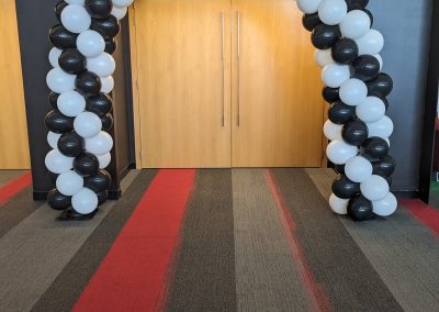 black and white balloon arch