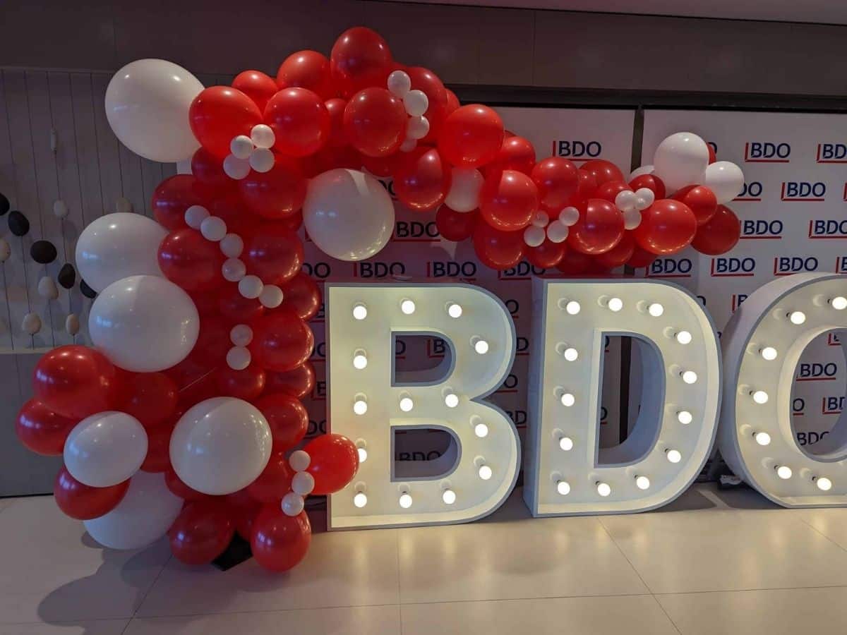 organic balloon arch on light up letters ballons near me
